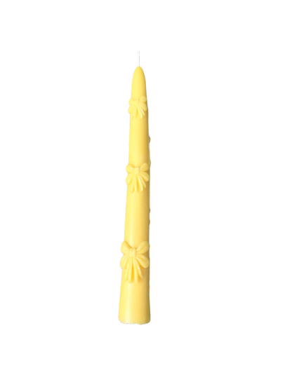 Bow tapered candle