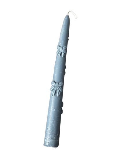 Bow tapered candle